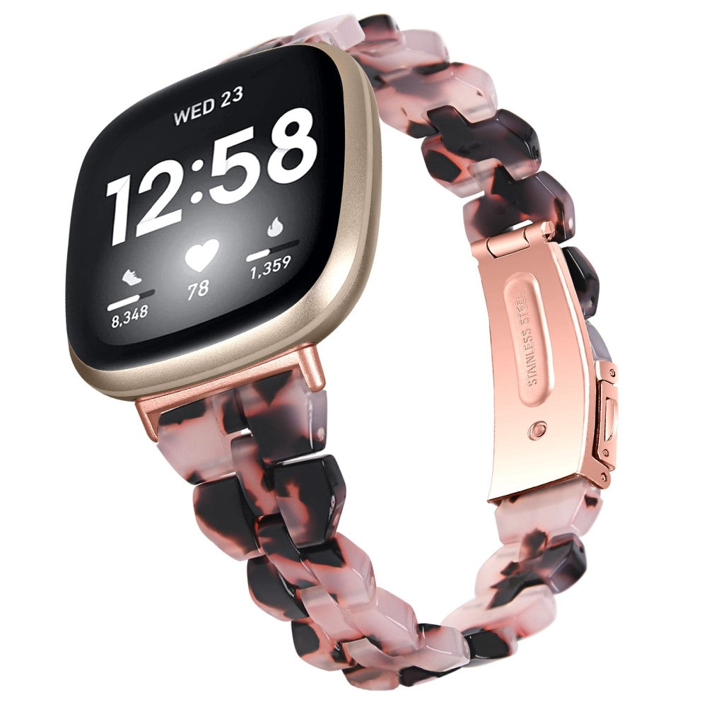 Black fitbit versa with rose gold band hotsell